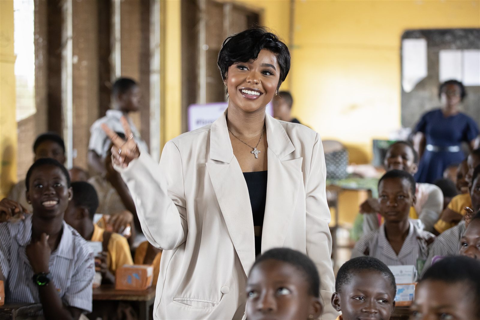 Veana Negasi, founder of The Wild Card Project, with students during a program in Accra